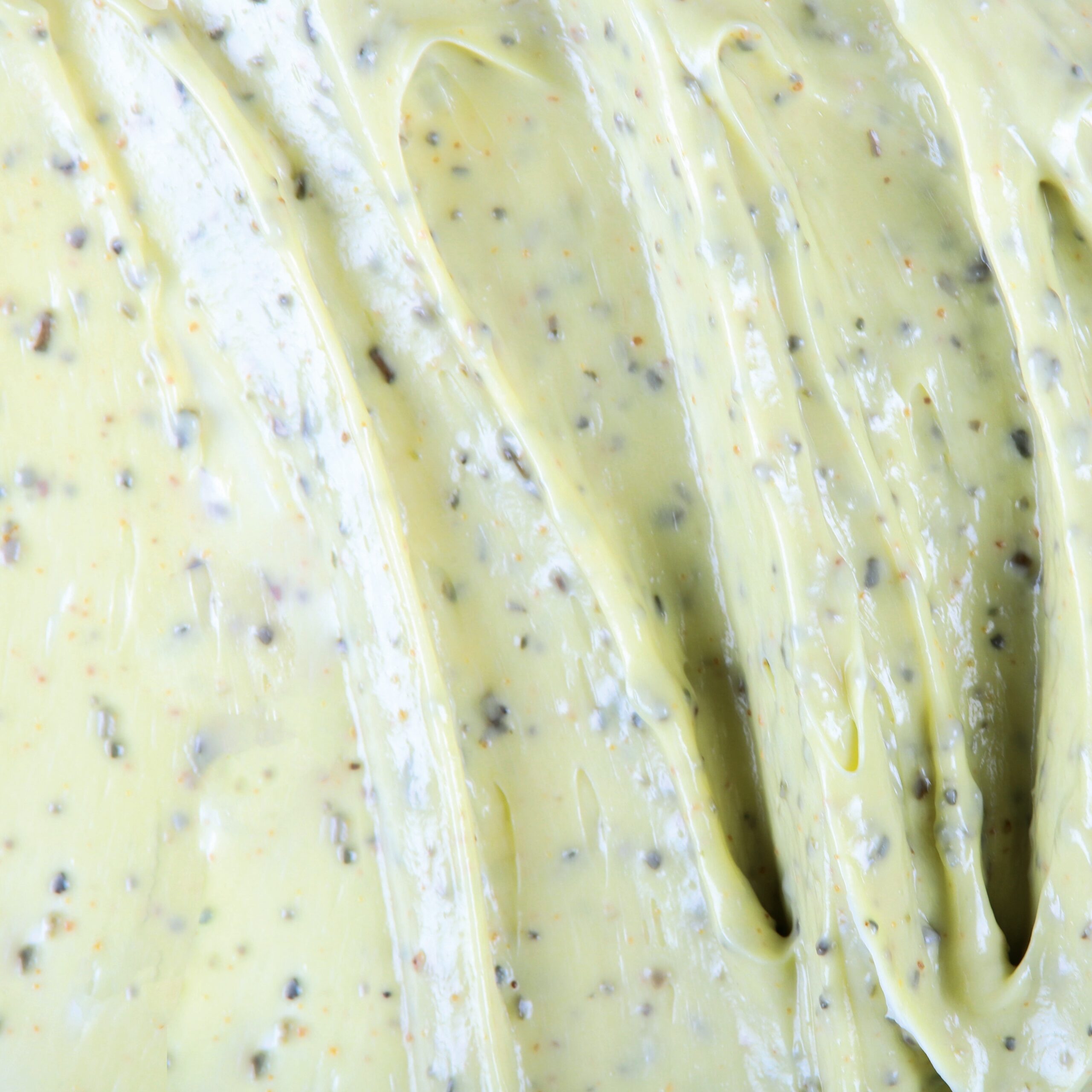 Face rich cream scrub with almond and pistachio, offering gentle exfoliation and a melting, comforting texture.