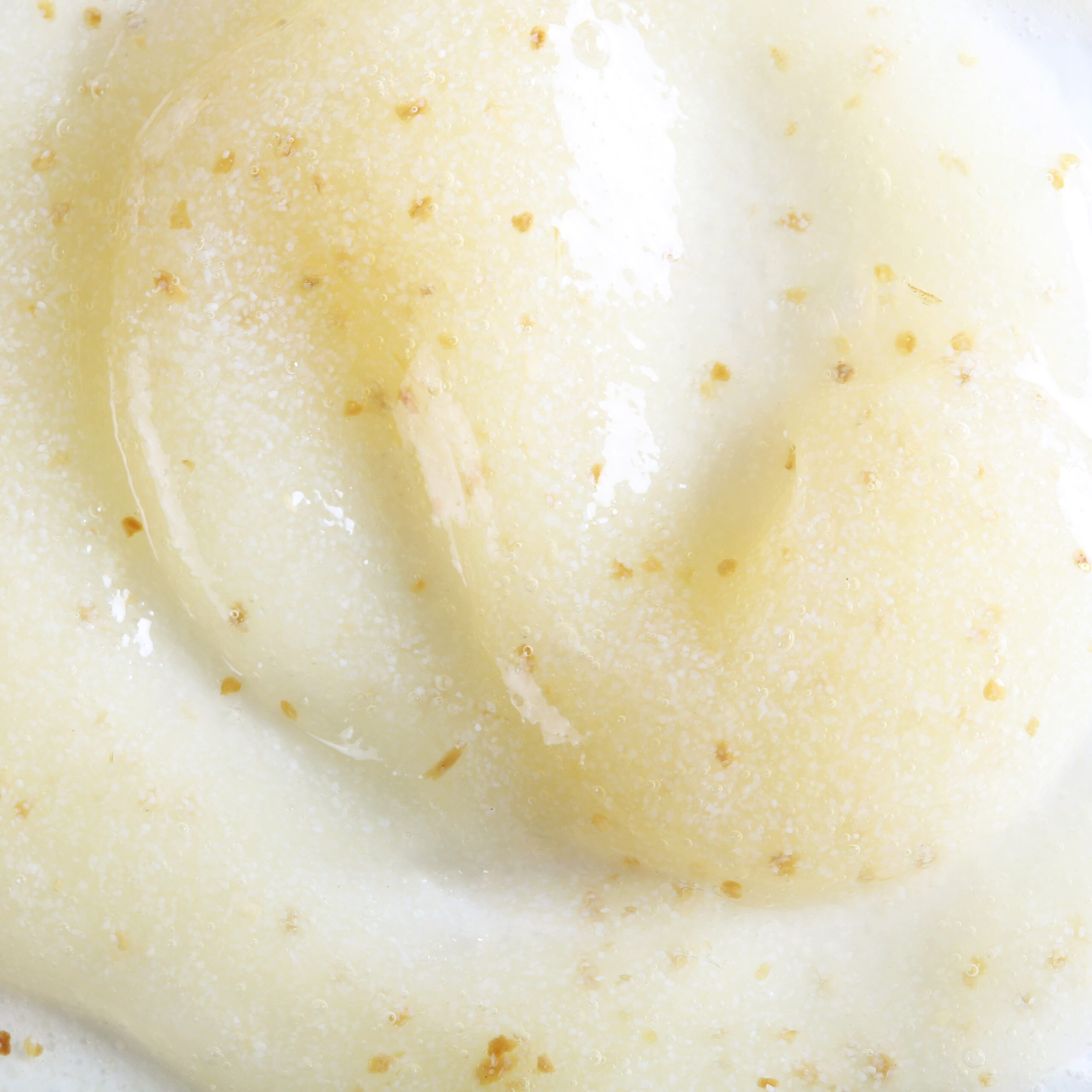Face gel scrub with ginger, offering gentle exfoliation and a fresh, invigorating texture.
