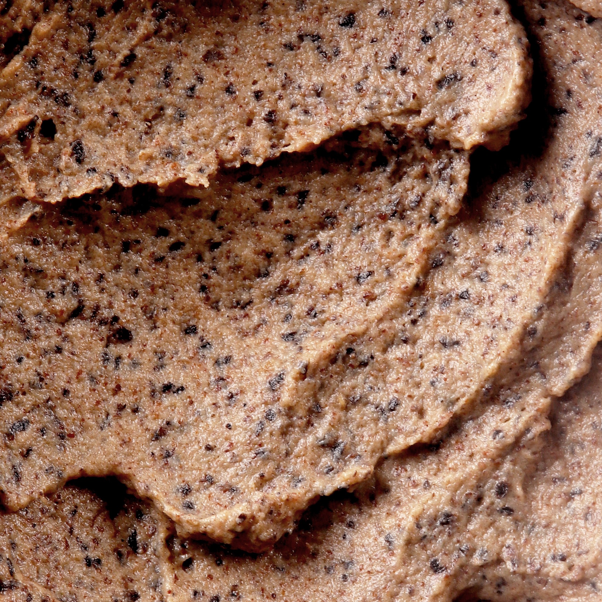 Face cream mousse scrub with coffee and cocoa, offering gentle exfoliation and a rich, creamy texture.